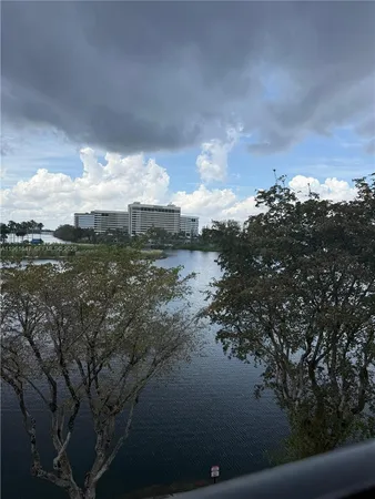 a view of a lake from a balcony