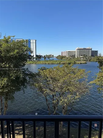 a view of a lake from a balcony