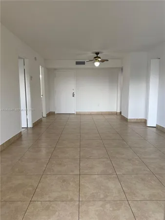 a kitchen with granite countertop a stove and a sink