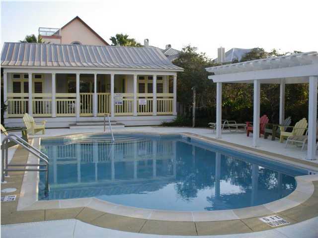 Lot 58 Old Beach Road Santa Rosa Beach, FL 32459 - Photo 21 of 23 a view of a white house with large windows