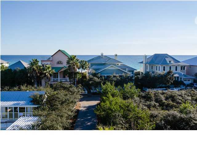 Lot 58 Old Beach Road Santa Rosa Beach, FL 32459 - Photo 4 of 23 a view of a house with a yard and sitting area