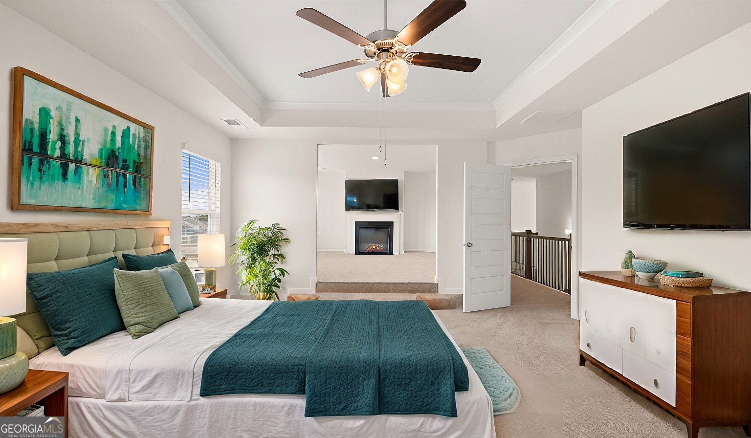 1776 Goodwin Drive Hampton, GA 30228 - Photo 11 of 59 a bedroom with a bed and a flat screen tv