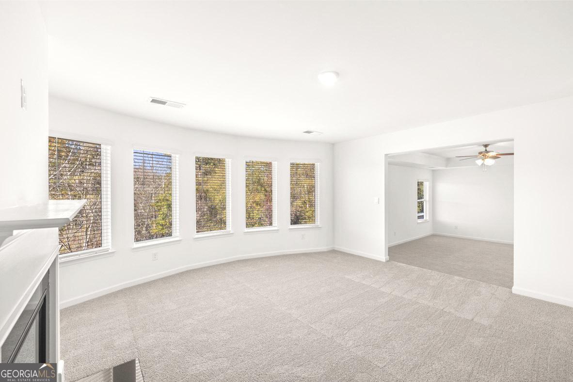 1776 Goodwin Drive Hampton, GA 30228 - Photo 16 of 59 a view of an empty room with a window