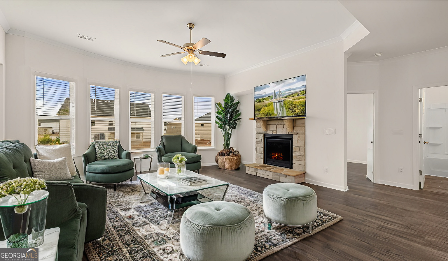 1776 Goodwin Drive Hampton, GA 30228 - Photo 22 of 59 a living room with furniture and a fireplace