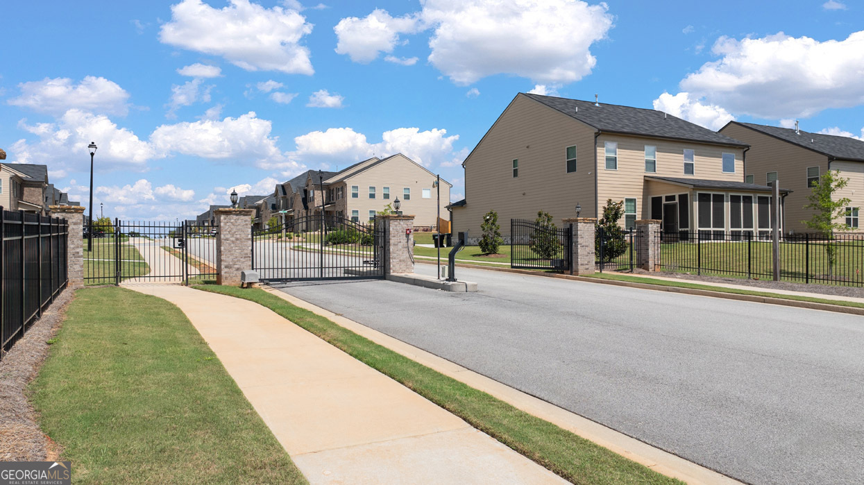 1776 Goodwin Drive Hampton, GA 30228 - Photo 5 of 59 a view of a house with a backyard
