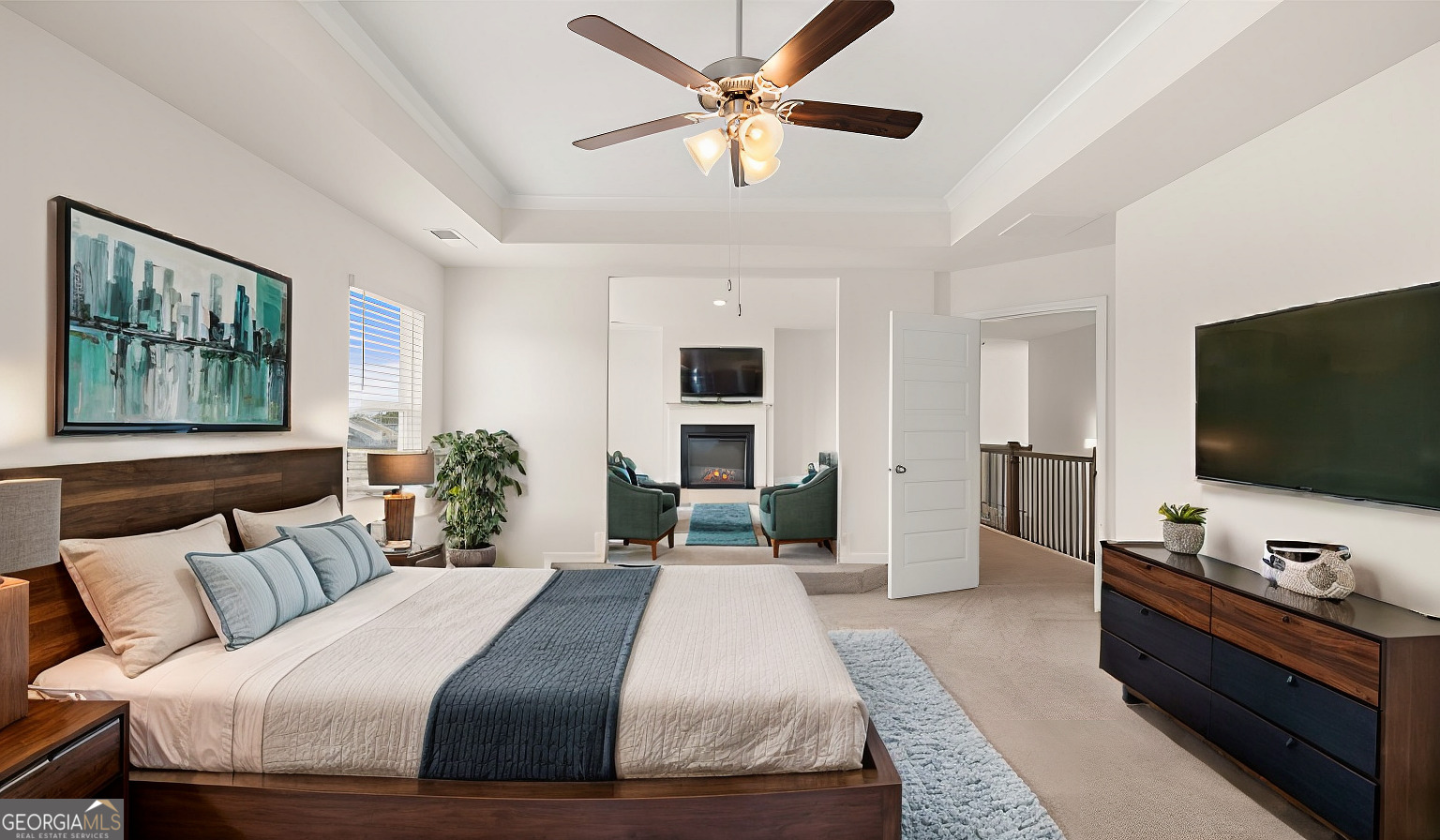 1776 Goodwin Drive Hampton, GA 30228 - Photo 55 of 59 a bedroom with a bed and a flat screen tv