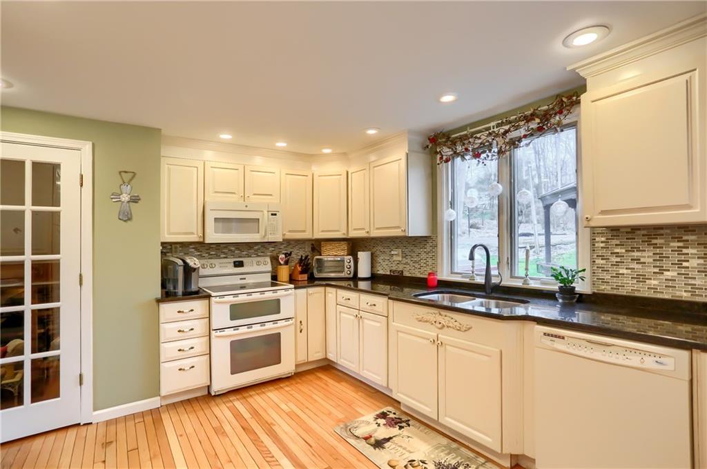 178 Mary Reed Road Baden, PA 15005 - Photo 4 of 25 Large updated kitchen with gleaming hardwoods.