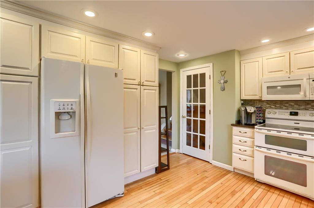 178 Mary Reed Road Baden, PA 15005 - Photo 5 of 25 Kitchen boasts double pantries,a side by side refrigerator and an electric stove with double oven