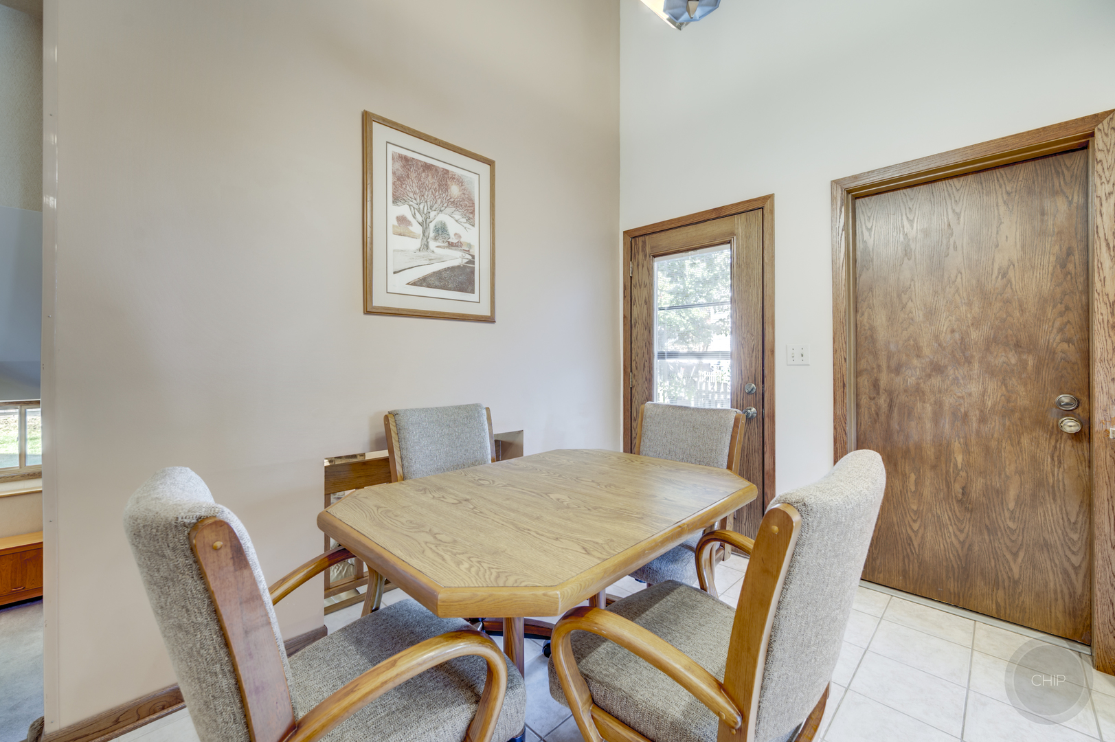 1259 Natchez Trace Circle Naperville, IL 60565 - Photo 15 of 56 a view of a dining room with furniture