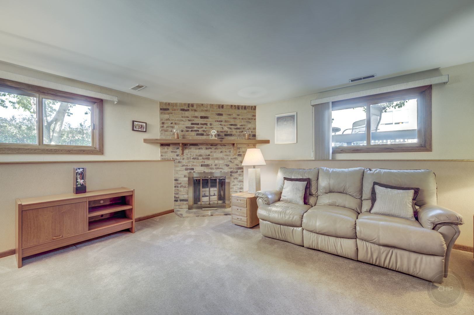 1259 Natchez Trace Circle Naperville, IL 60565 - Photo 17 of 56 a living room with furniture and a fireplace