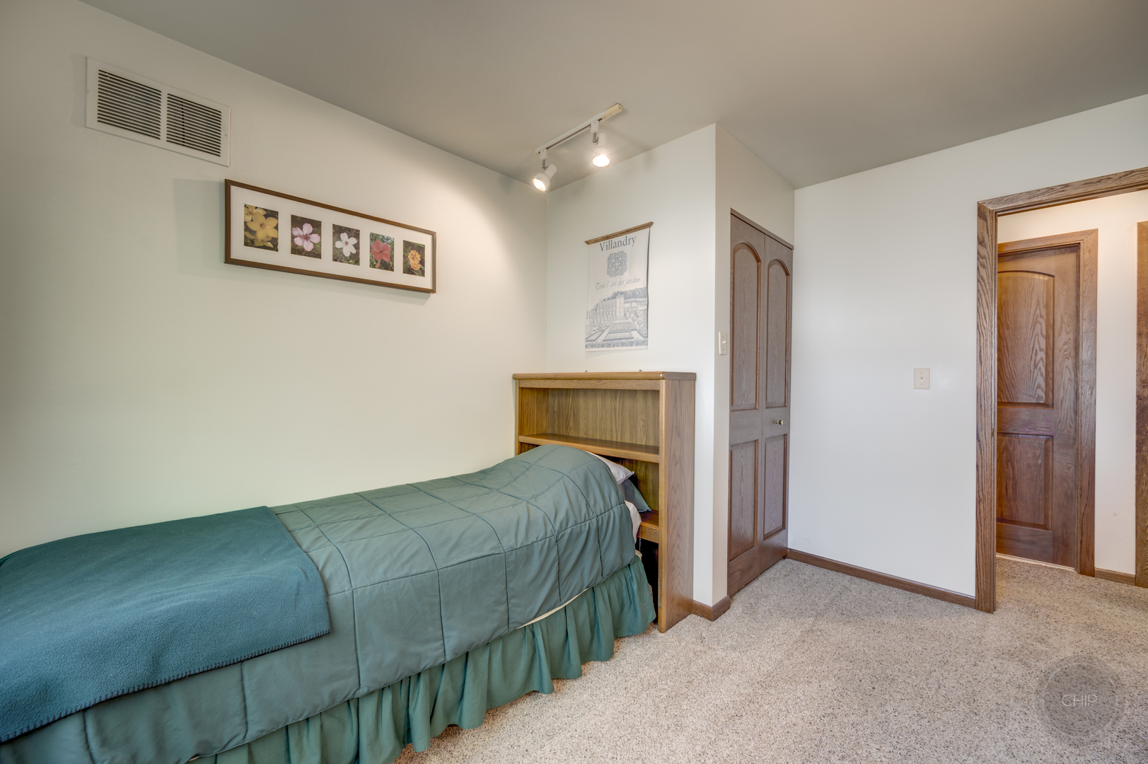 1259 Natchez Trace Circle Naperville, IL 60565 - Photo 29 of 56 a bedroom with a bed and a painting on the wall
