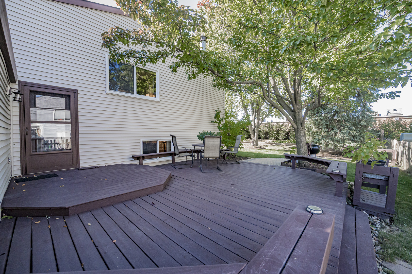 1259 Natchez Trace Circle Naperville, IL 60565 - Photo 43 of 56 a view of a backyard with sitting area