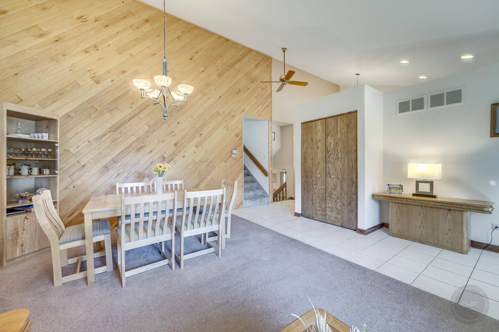 1259 Natchez Trace Circle Naperville, IL 60565 - Photo 7 of 56 a dining room with furniture and chandelier
