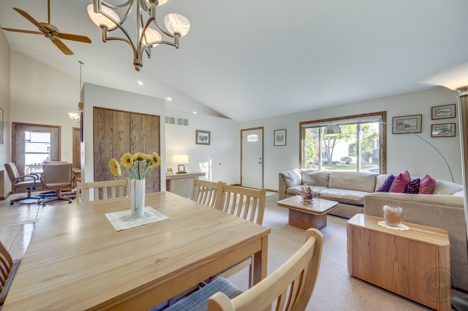1259 Natchez Trace Circle Naperville, IL 60565 - Photo 8 of 56 a living room with furniture and a wooden floor