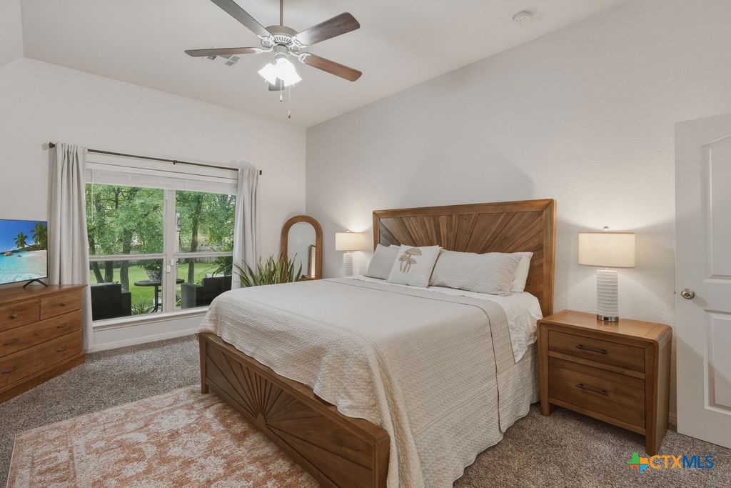 3306 Spring Canyon Road Belton, TX 76513 - Photo 23 of 40 a bed room with a bed and a large window