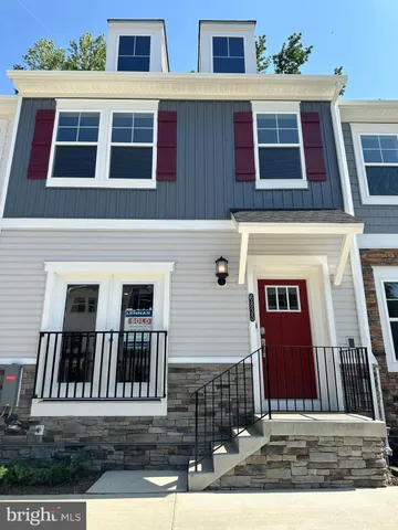 a view of a brick building with many windows