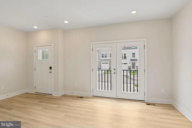 a view of entryway with wooden floor