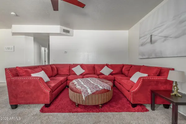 a living room with furniture and a couch