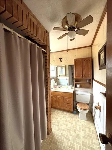 a kitchen with sink refrigerator and stove