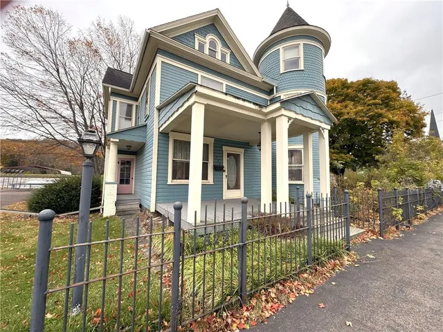 front view of a house with a lot of windows