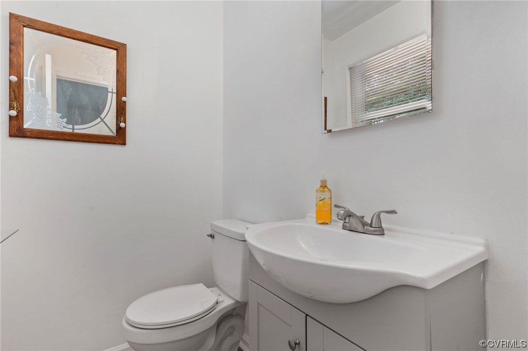 5817 Middle Road Prince George, VA 23875 - Photo 19 of 32 primary bath New vinyl, sink, toilet