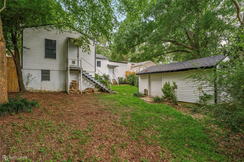 515 Davis Street Minden, LA 71055 - Photo 27 of 28 a view of a house with a yard