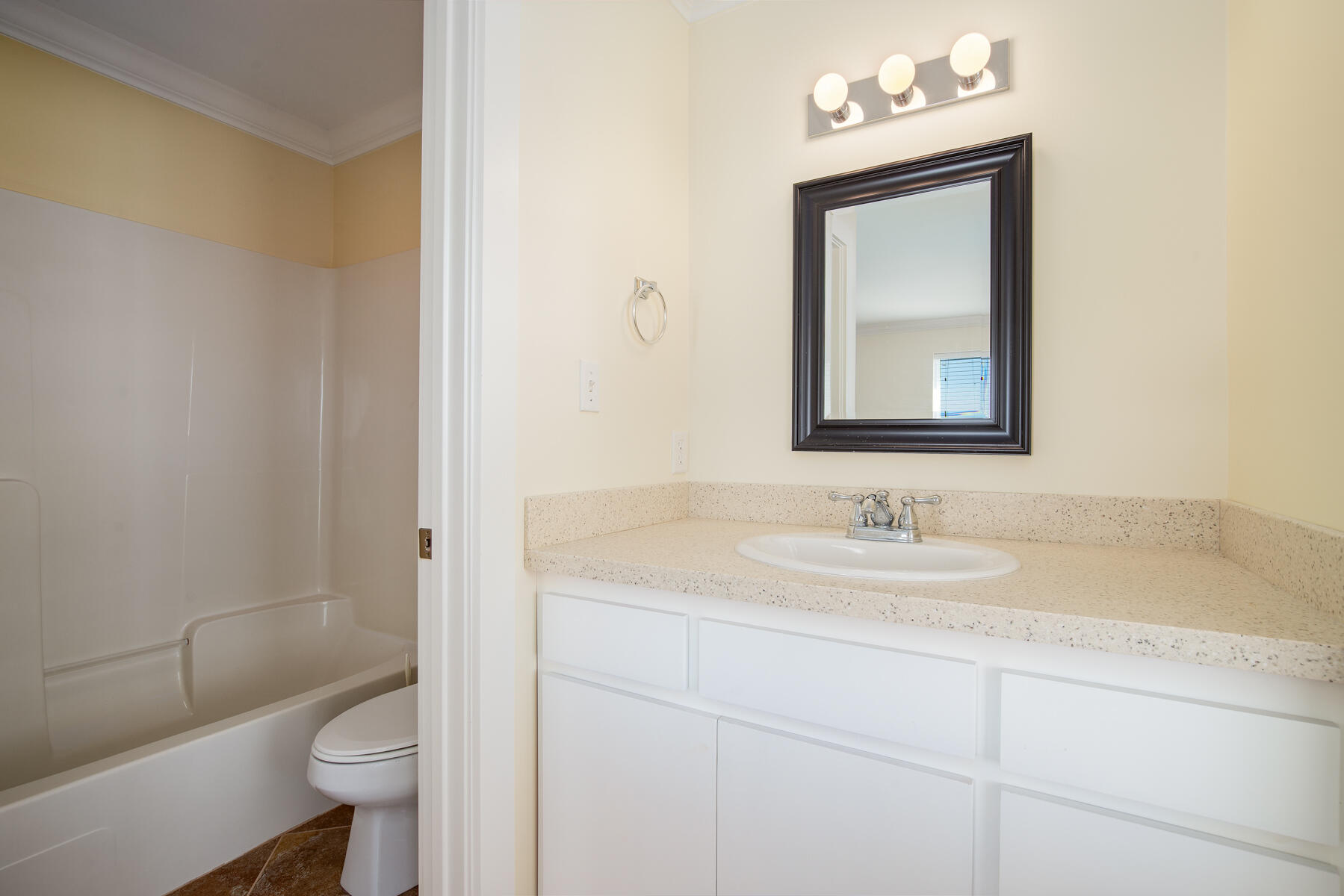 2 Hotz Avenue Santa Rosa Beach, FL 32459 - Photo 26 of 54 a bathroom with a toilet sink and mirror