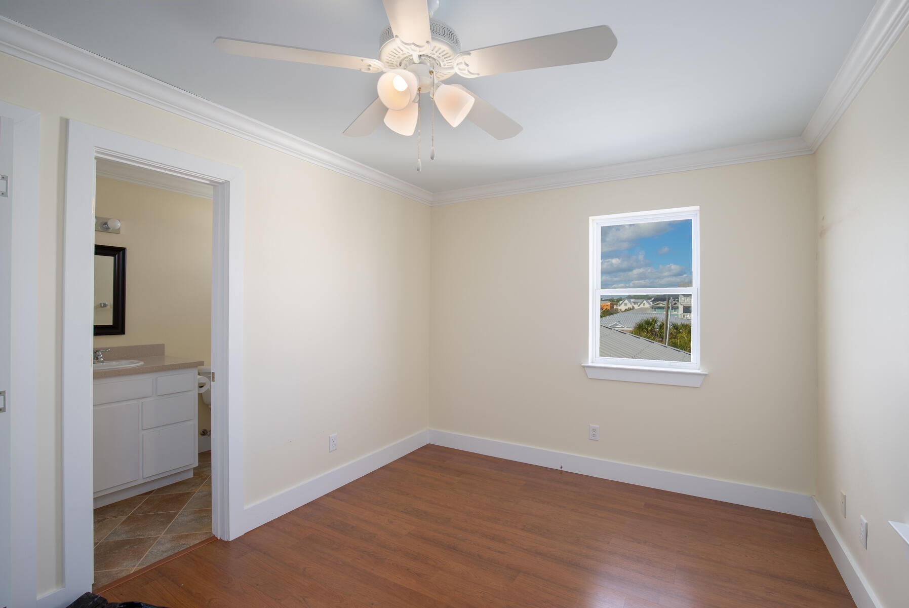 2 Hotz Avenue Santa Rosa Beach, FL 32459 - Photo 28 of 54 wooden floor in an empty room with a window