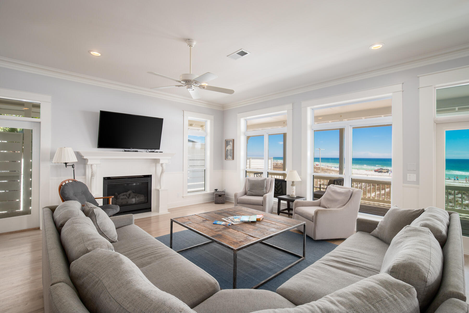 2 Hotz Avenue Santa Rosa Beach, FL 32459 - Photo 3 of 54 a living room with furniture a fireplace and a flat screen tv