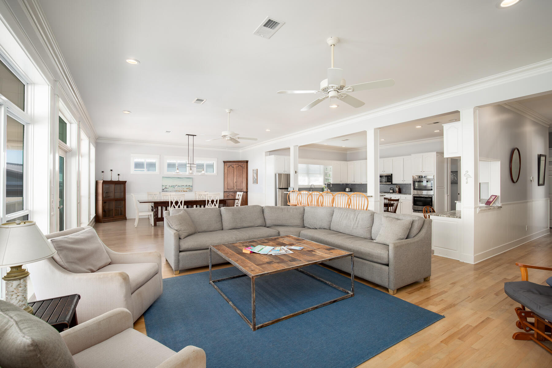 2 Hotz Avenue Santa Rosa Beach, FL 32459 - Photo 36 of 54 a living room with furniture kitchen view and a chandelier