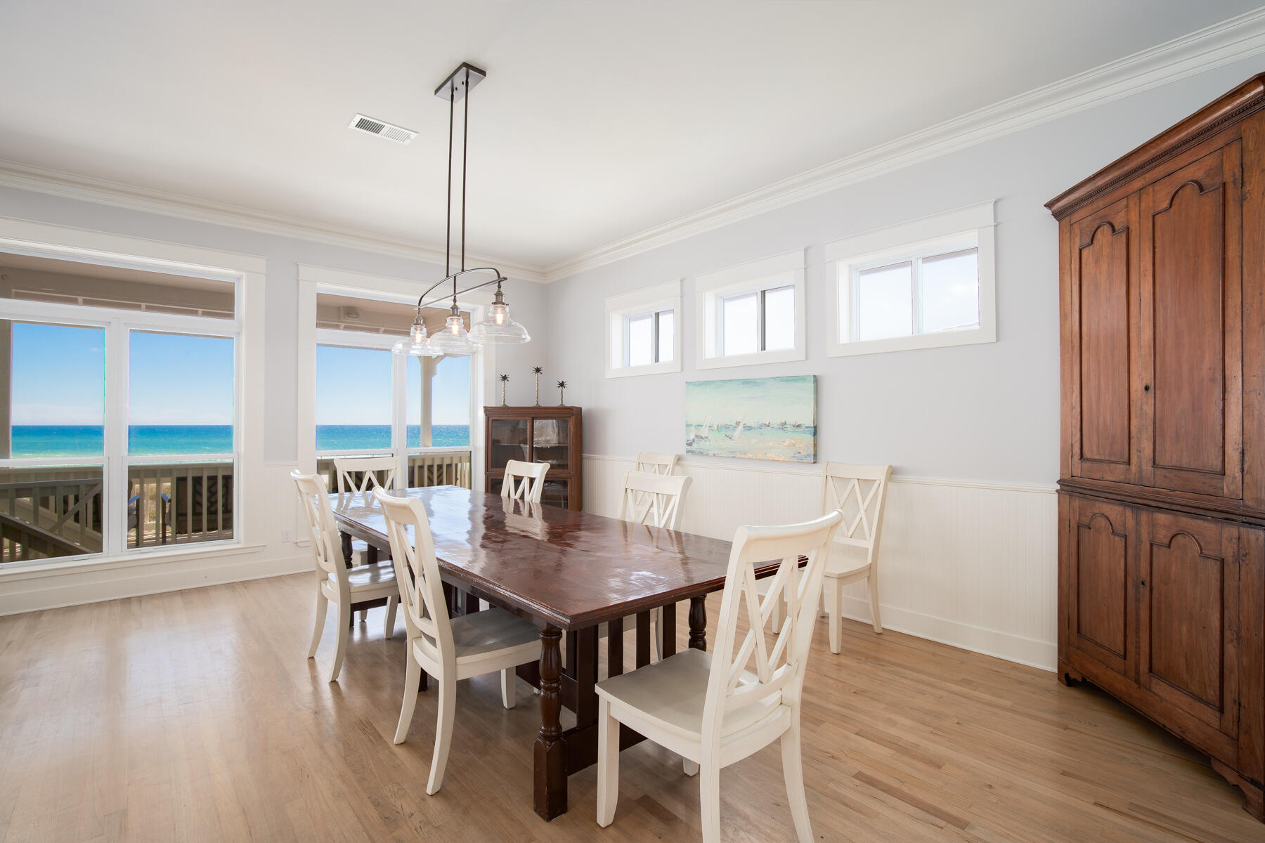 2 Hotz Avenue Santa Rosa Beach, FL 32459 - Photo 6 of 54 a view of a dining room with furniture window and wooden floor