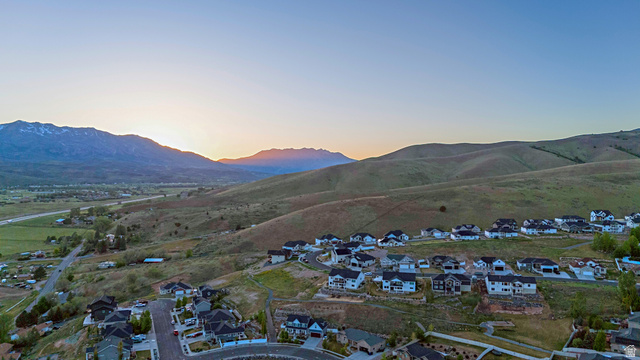 851 Grandview Drive Morgan, UT 84050 - Photo 67 of 68 Aerial perspective showcasing a residential development set against a backdrop of rolling hills and distant mountains