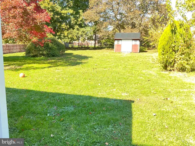 a view of a yard with an outdoor space