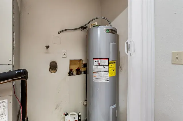 a view of bathroom with shower and mirror