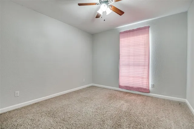 a bathroom with a sink toilet and vanity
