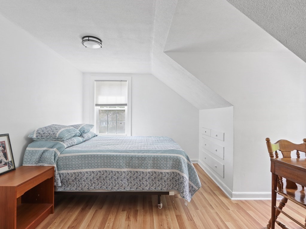 26 Elda Road Framingham, MA 01701 - Photo 14 of 27 a bedroom with a bed and a window