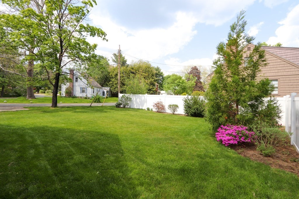 26 Elda Road Framingham, MA 01701 - Photo 26 of 27 a front view of a house with backyard