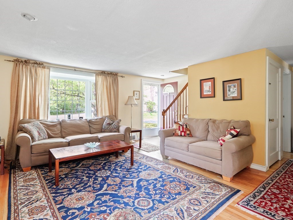 26 Elda Road Framingham, MA 01701 - Photo 4 of 27 a living room with furniture and wooden floor