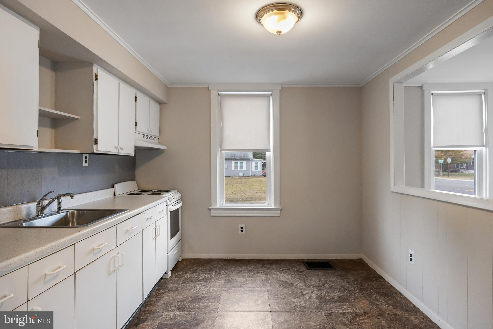 1500 Mt Holly Road, Unit 1F Burlington, NJ 08016 - Photo 12 of 21 a kitchen with a sink and cabinets