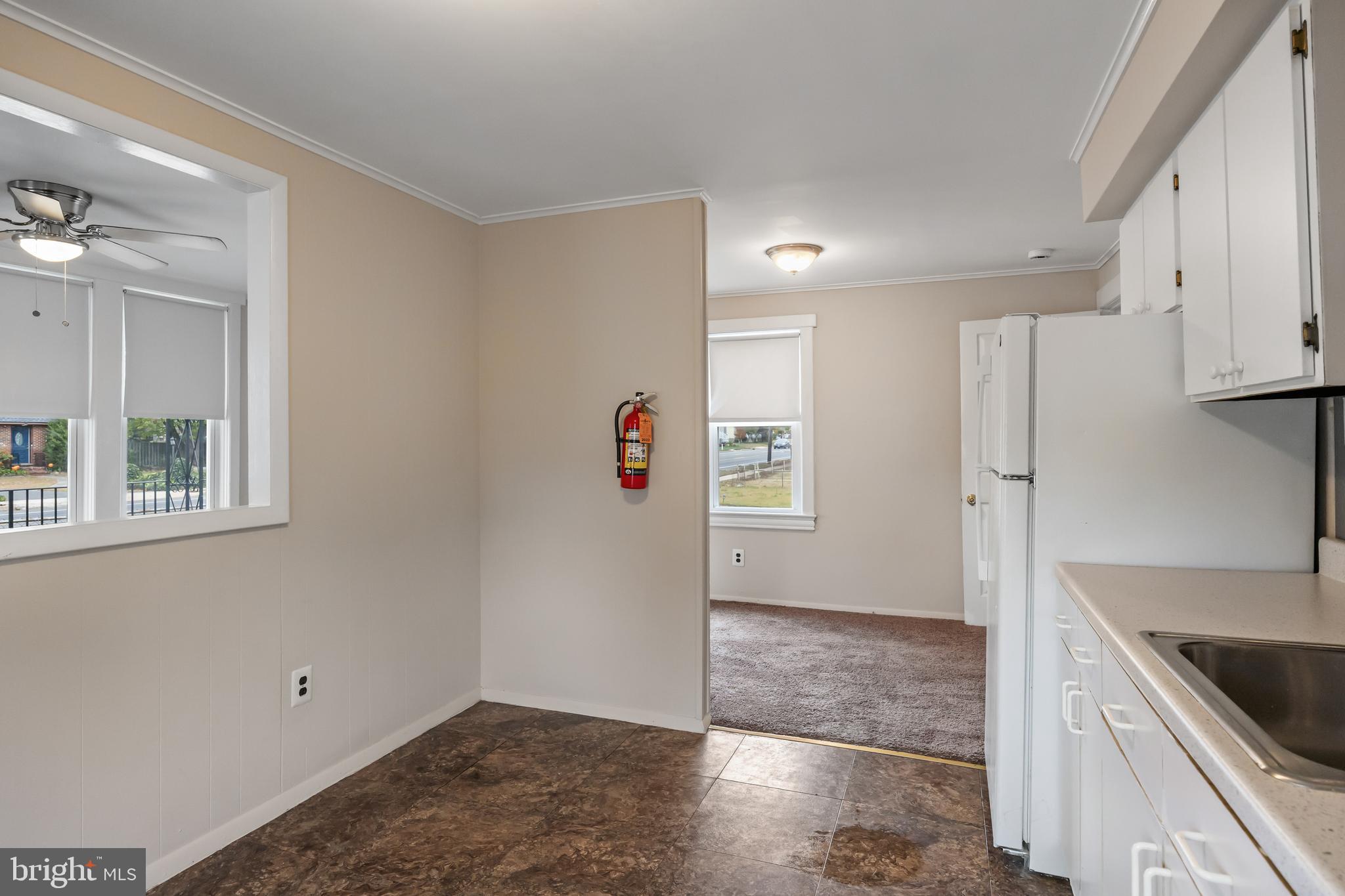 1500 Mt Holly Road, Unit 1F Burlington, NJ 08016 - Photo 14 of 21 a view of kitchen with a sink refrigerator and window