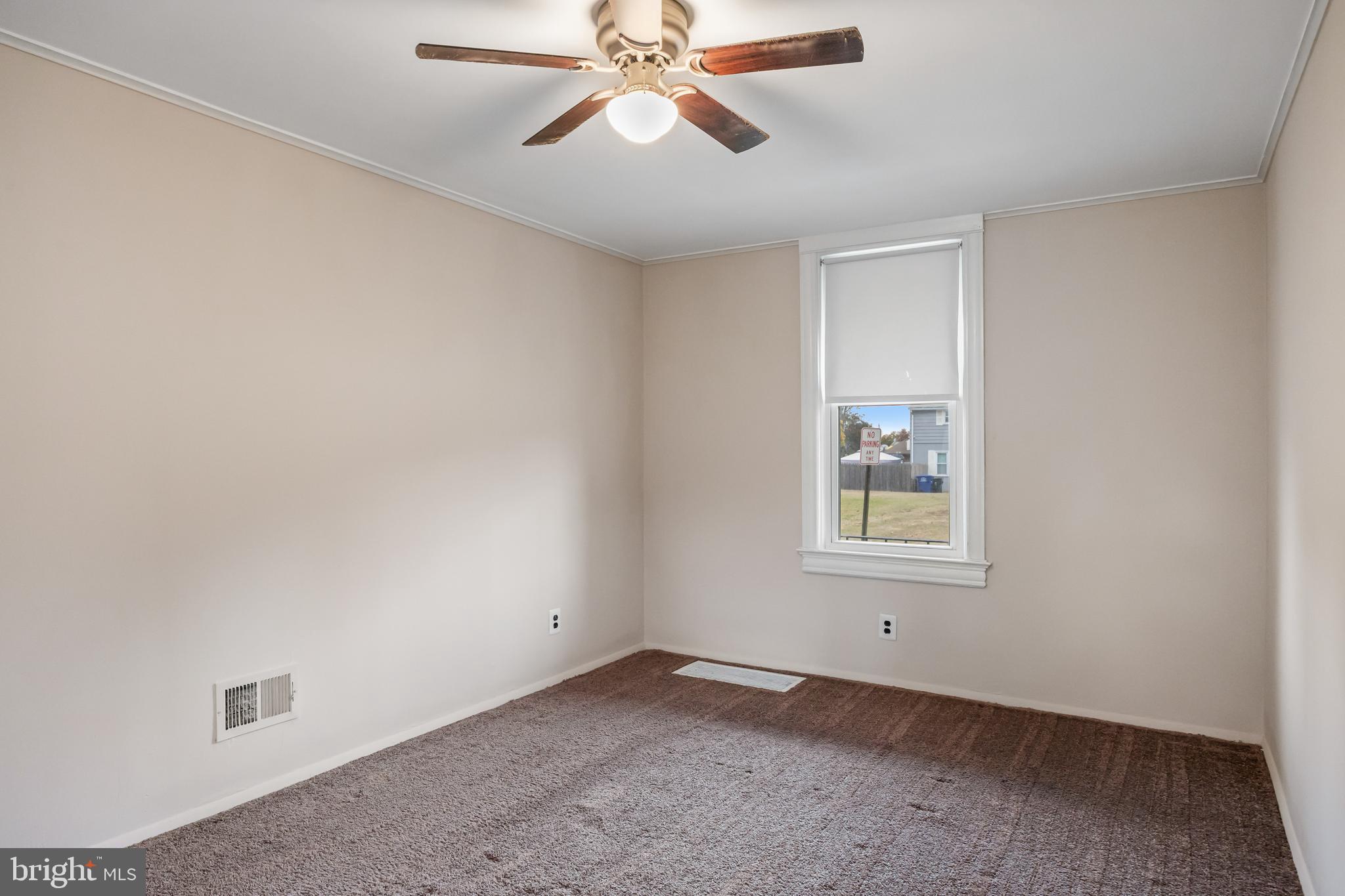 1500 Mt Holly Road, Unit 1F Burlington, NJ 08016 - Photo 17 of 21 an empty room with windows and fan