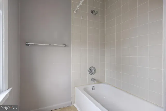 a bathroom with a bathtub