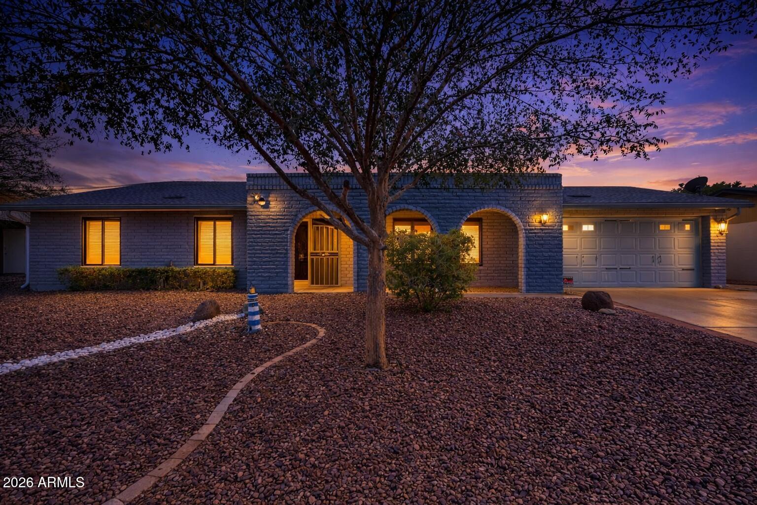 2201 West Utopia Road Phoenix, AZ 85027 - Photo 1 of 50 a front view of a house with garden