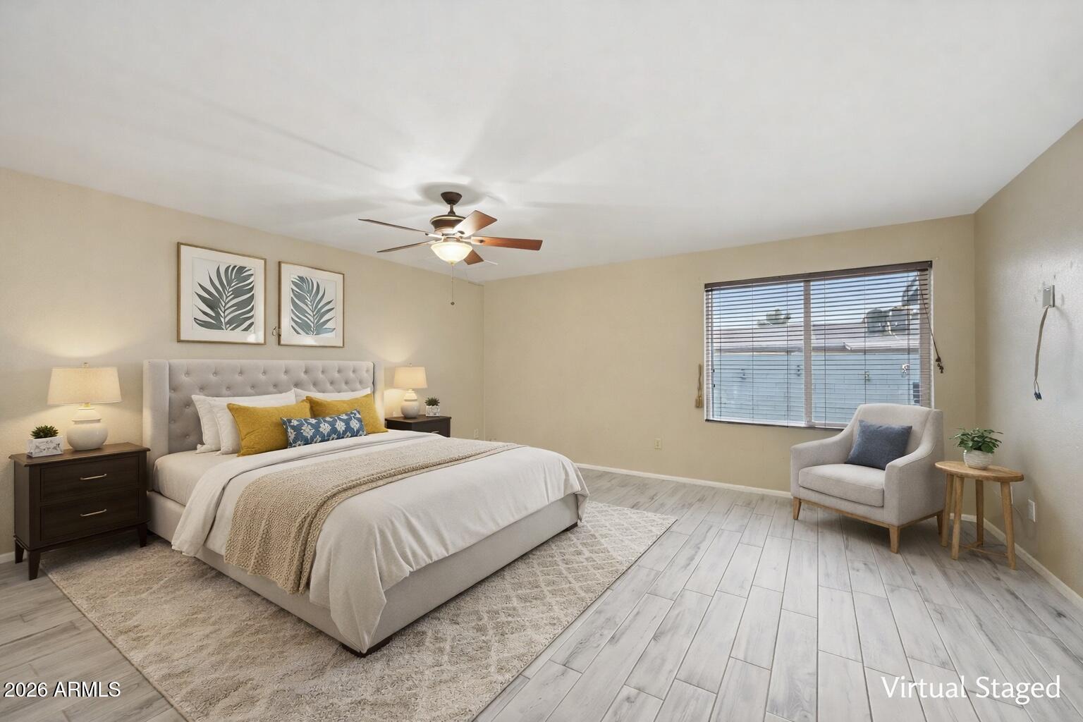 2201 West Utopia Road Phoenix, AZ 85027 - Photo 30 of 50 a bedroom with a bed and a chandelier