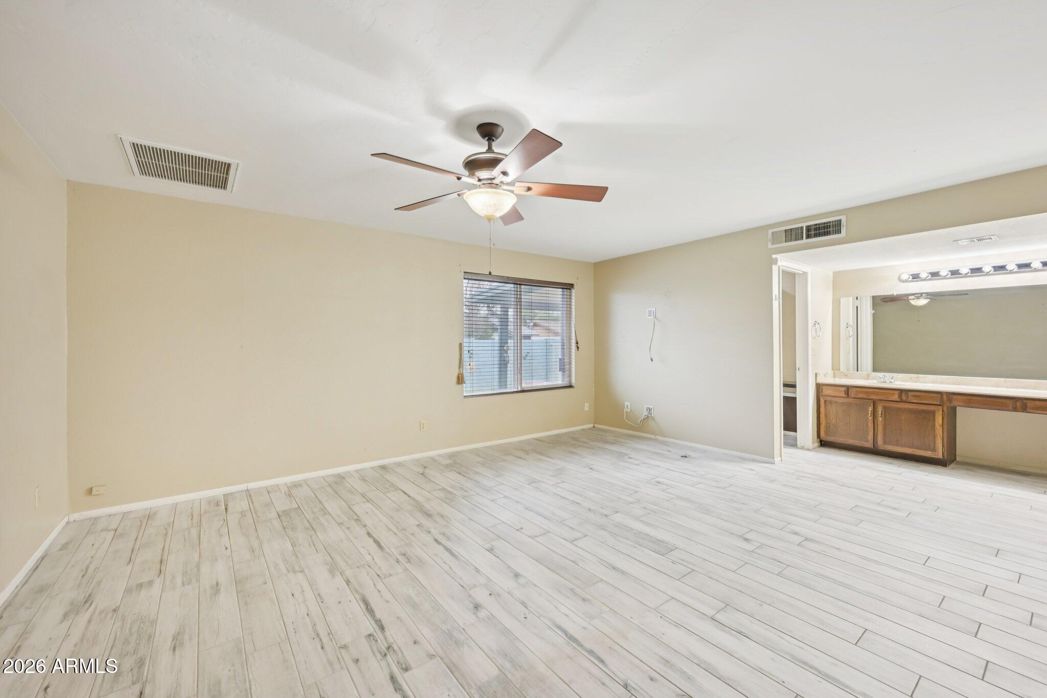 2201 West Utopia Road Phoenix, AZ 85027 - Photo 31 of 50 a view of an empty room with a window