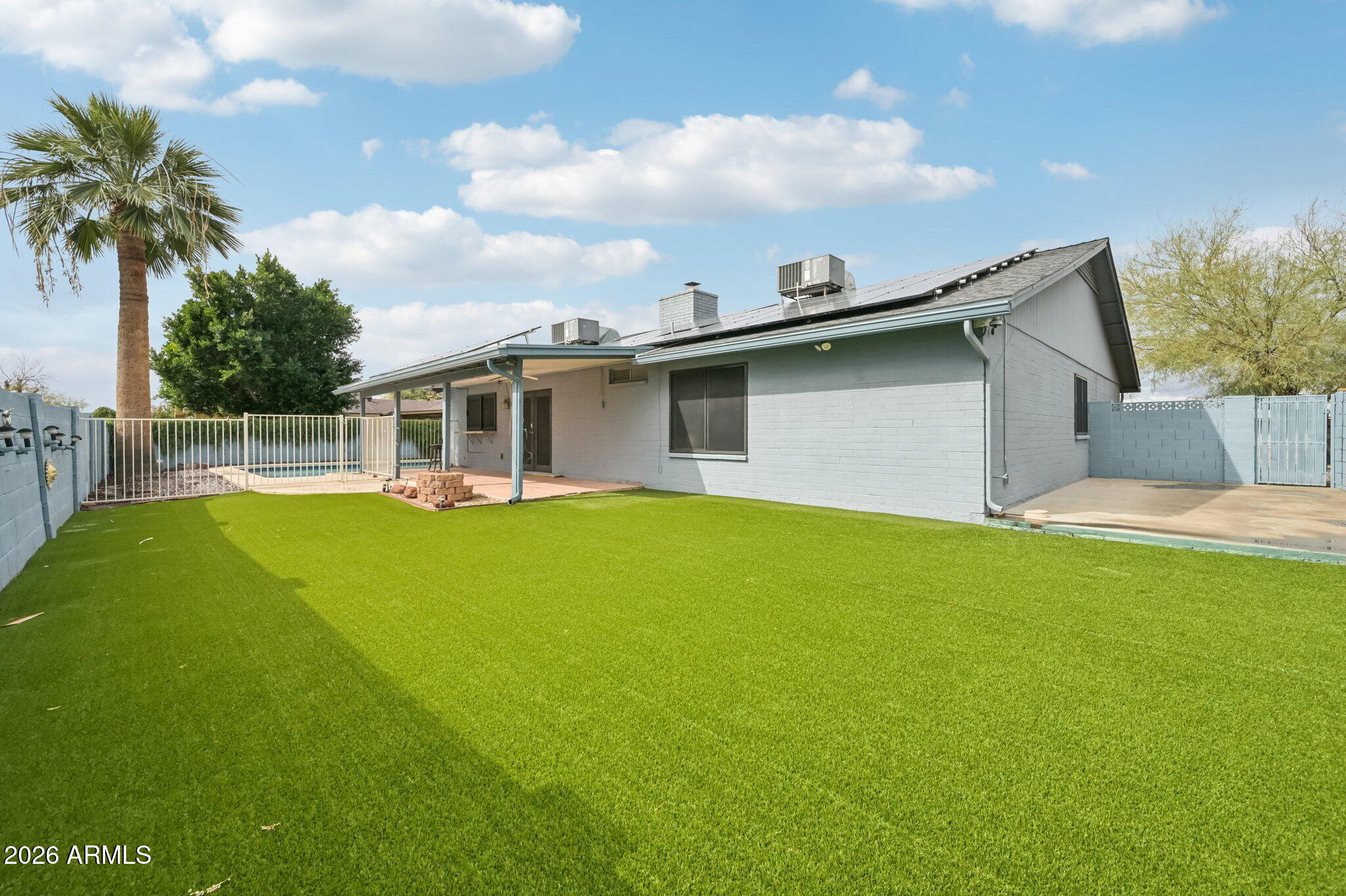 2201 West Utopia Road Phoenix, AZ 85027 - Photo 43 of 50 a view of a house with a backyard