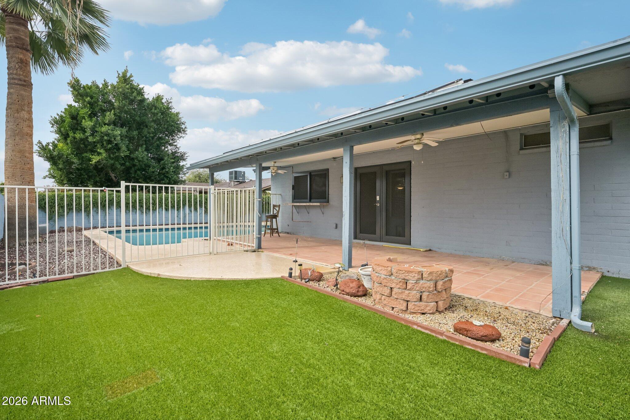 2201 West Utopia Road Phoenix, AZ 85027 - Photo 44 of 50 a view of house with backyard and porch