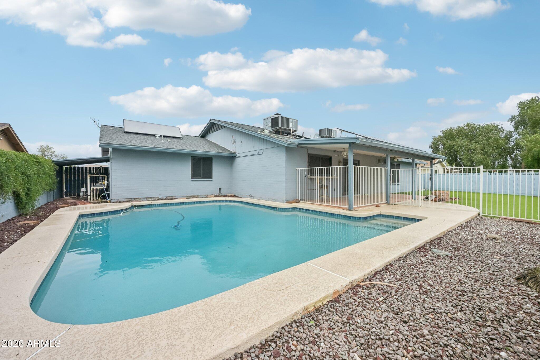 2201 West Utopia Road Phoenix, AZ 85027 - Photo 48 of 50 a view of outdoor space yard and swimming pool
