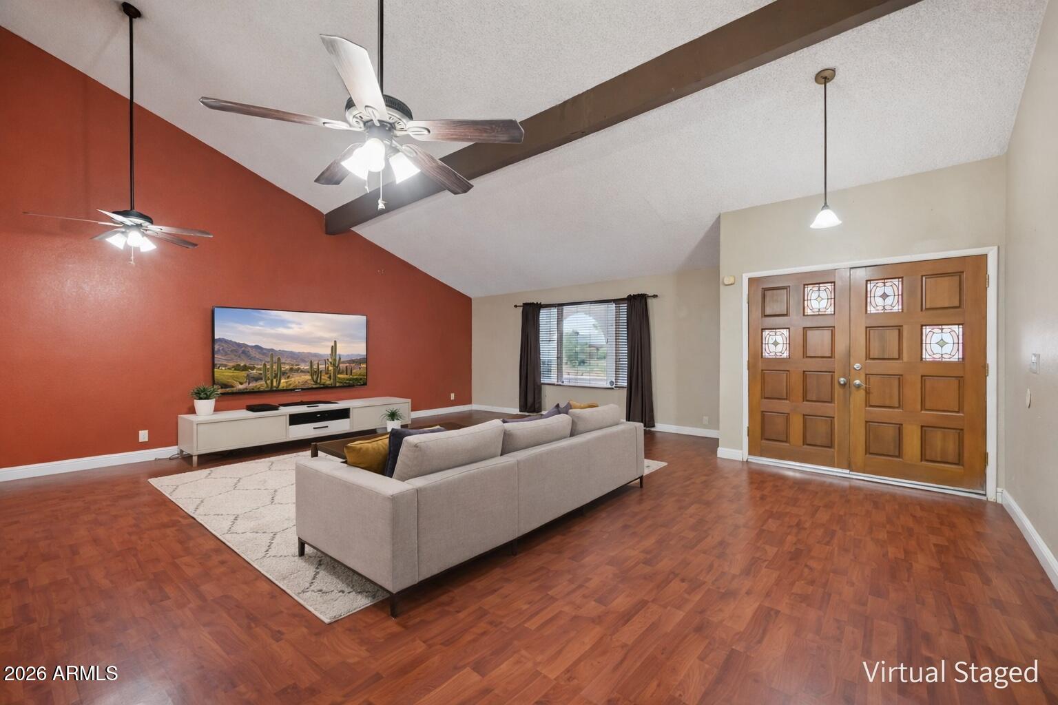 2201 West Utopia Road Phoenix, AZ 85027 - Photo 7 of 50 a living room with furniture and a flat screen tv