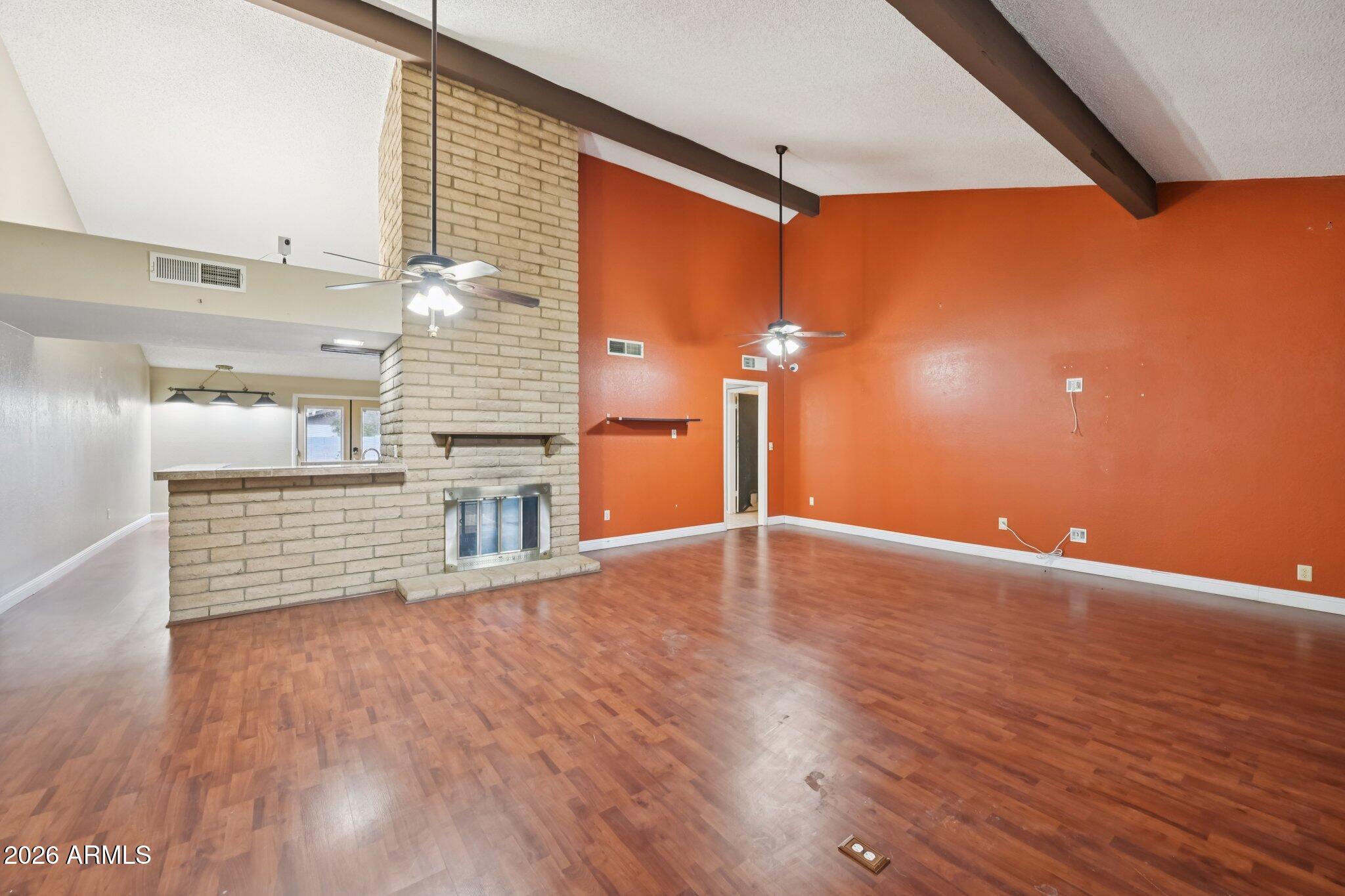 2201 West Utopia Road Phoenix, AZ 85027 - Photo 8 of 50 a view of a livingroom with wooden floor